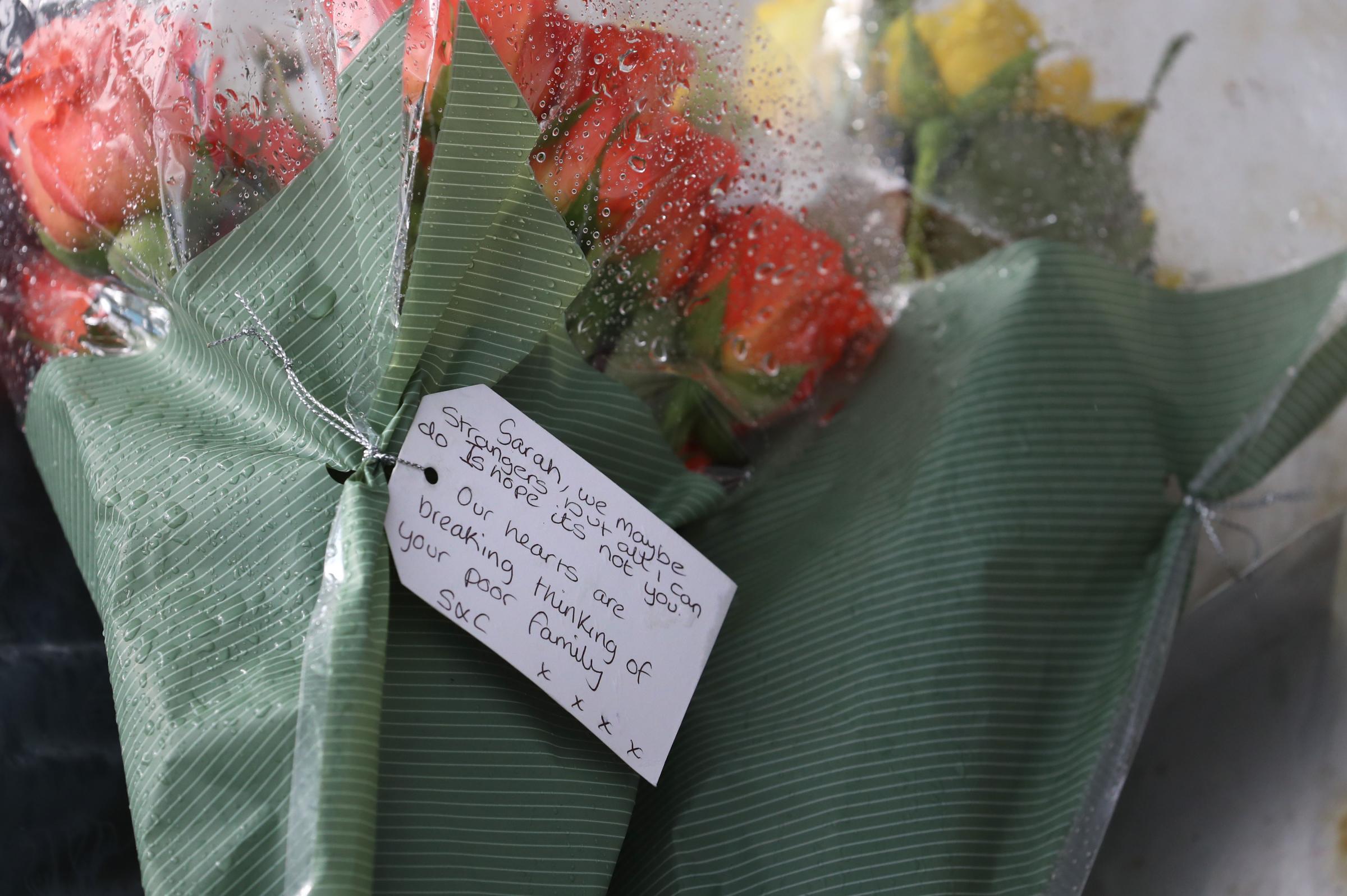 Flowers from members of the public left near Great Chart Golf and Leisure near Ashford in Kent following the discovery of human remains in the hunt for missing Sarah Everard. The Met Police announced on Wednesday that a diplomatic protection officer held